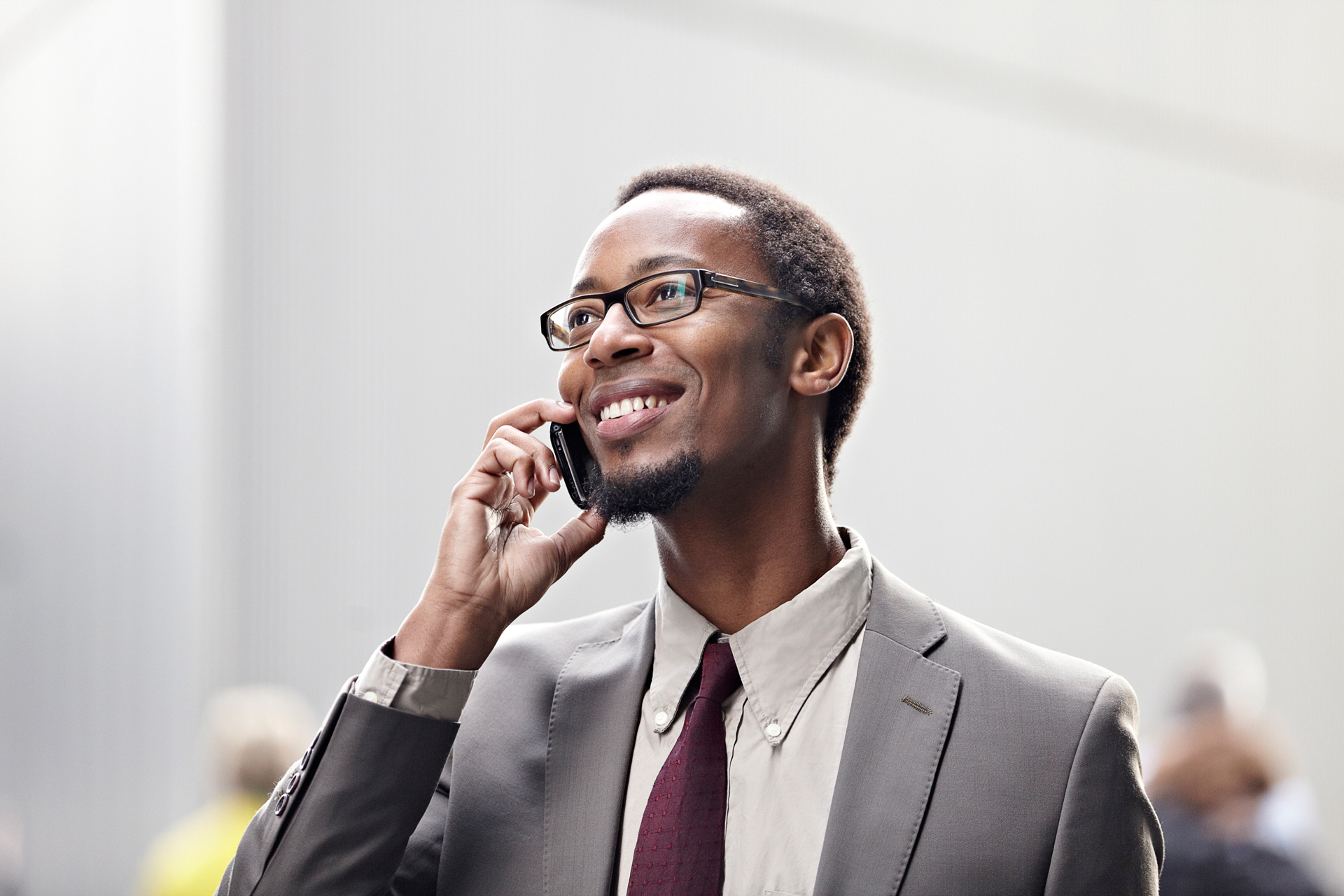 corporate photography portrait of business man talking on mobile phone