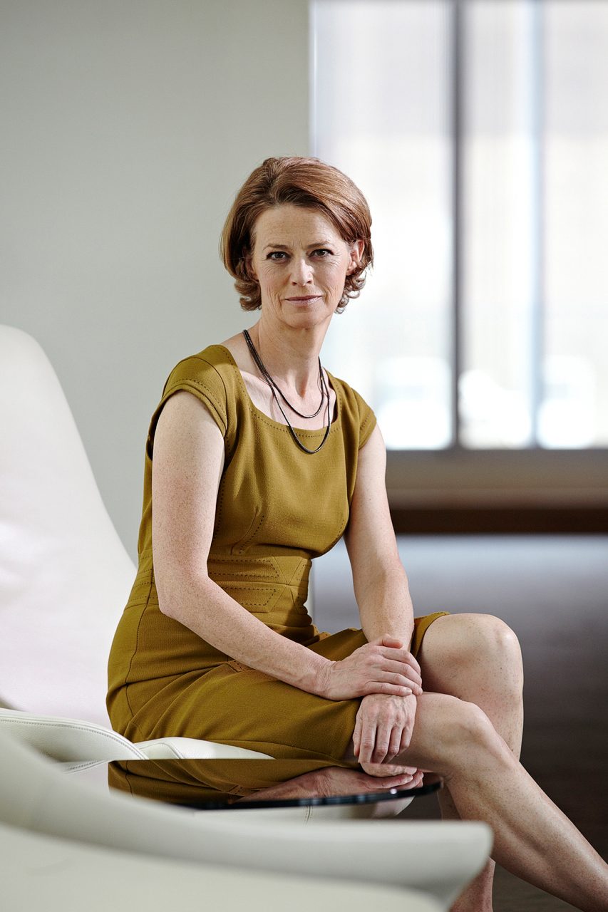 corporate photography portrait of senior business woman sat in office